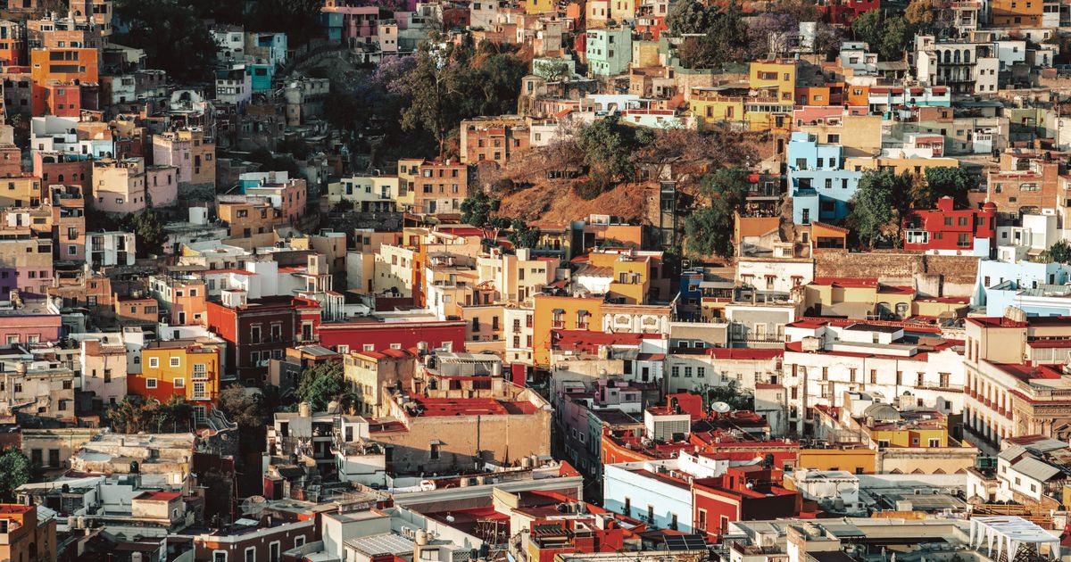 Colorful houses and architecture of Guanajuato City, Mexico, create a vivid cityscape.
